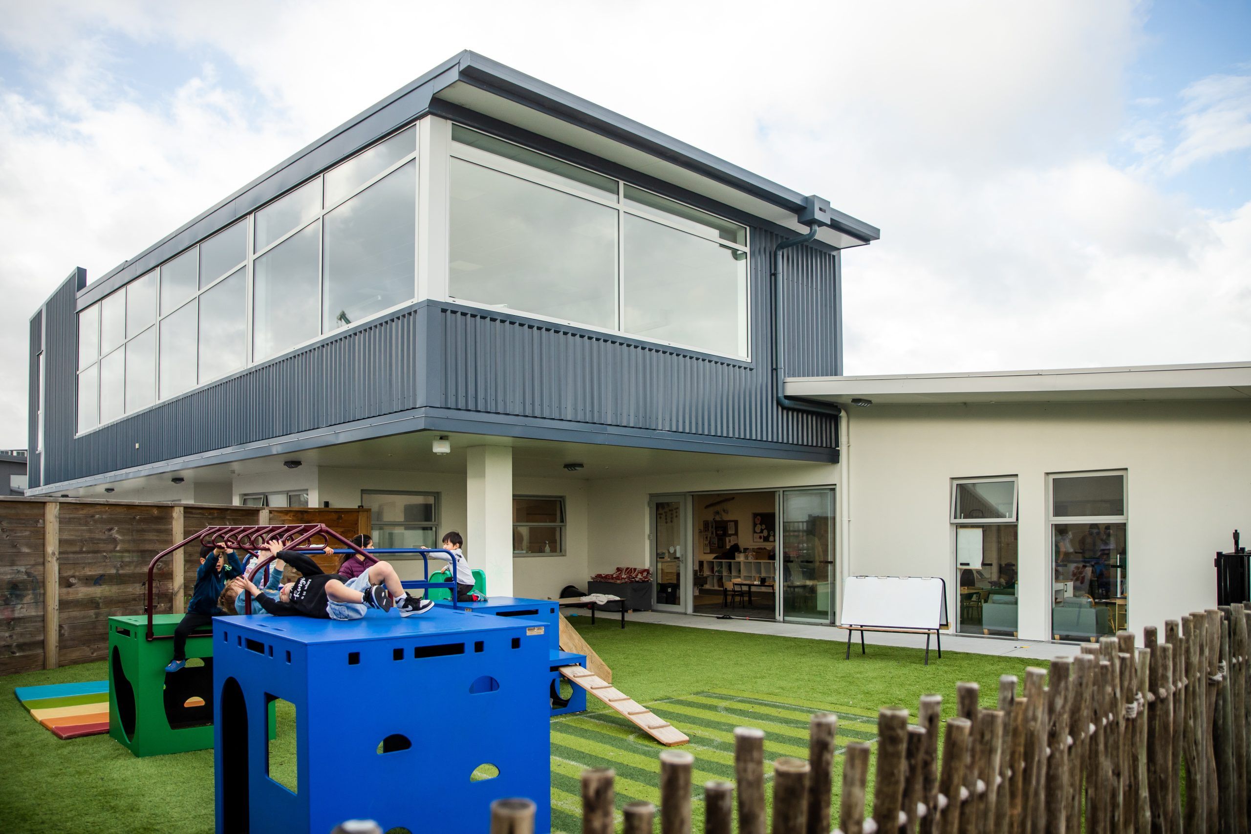 Nurture and Bloom | Purpose built childcare centre showing an outdoor playspace with playground equipment