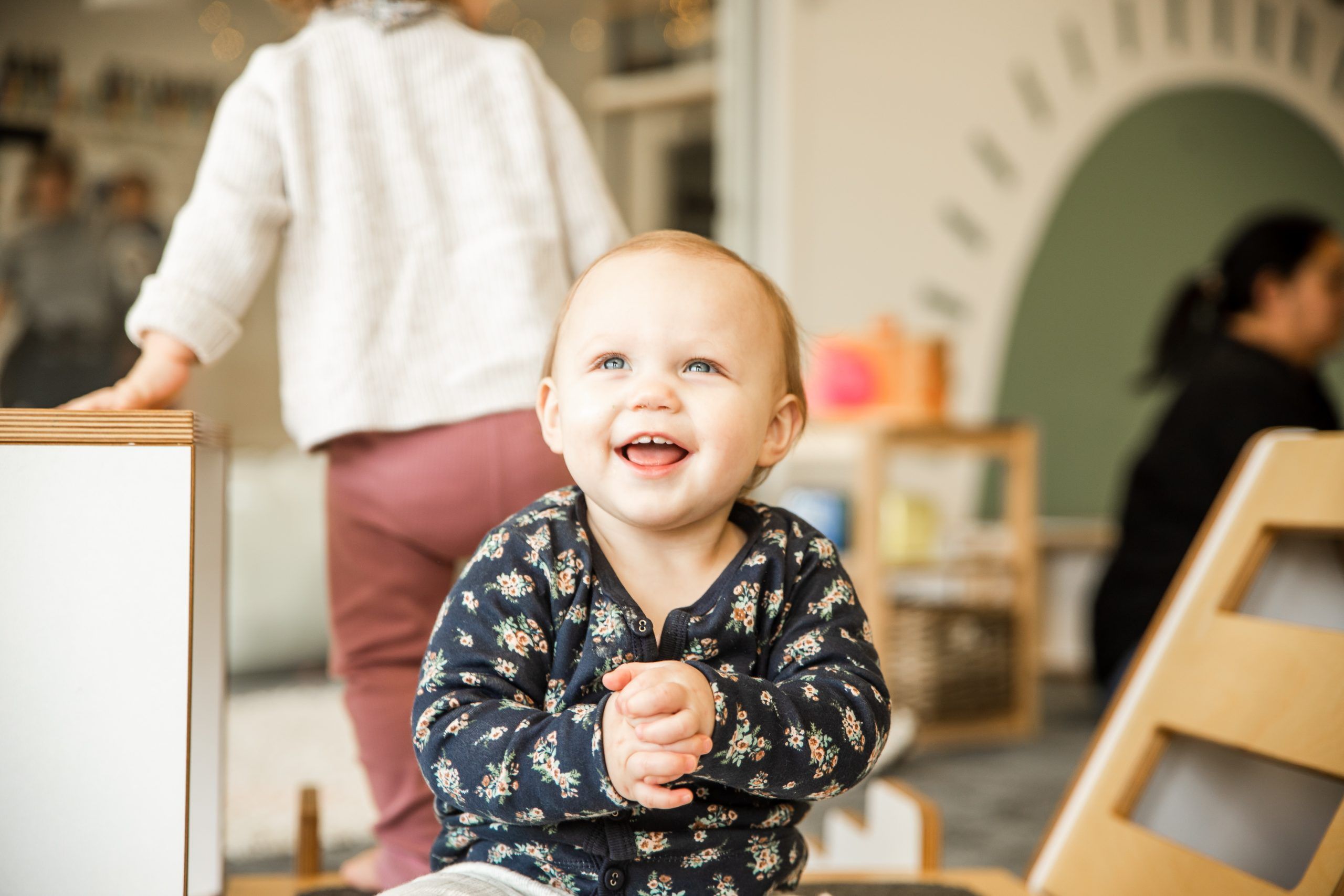 Nurture and Bloom | Child having fun with teacher with interactive play