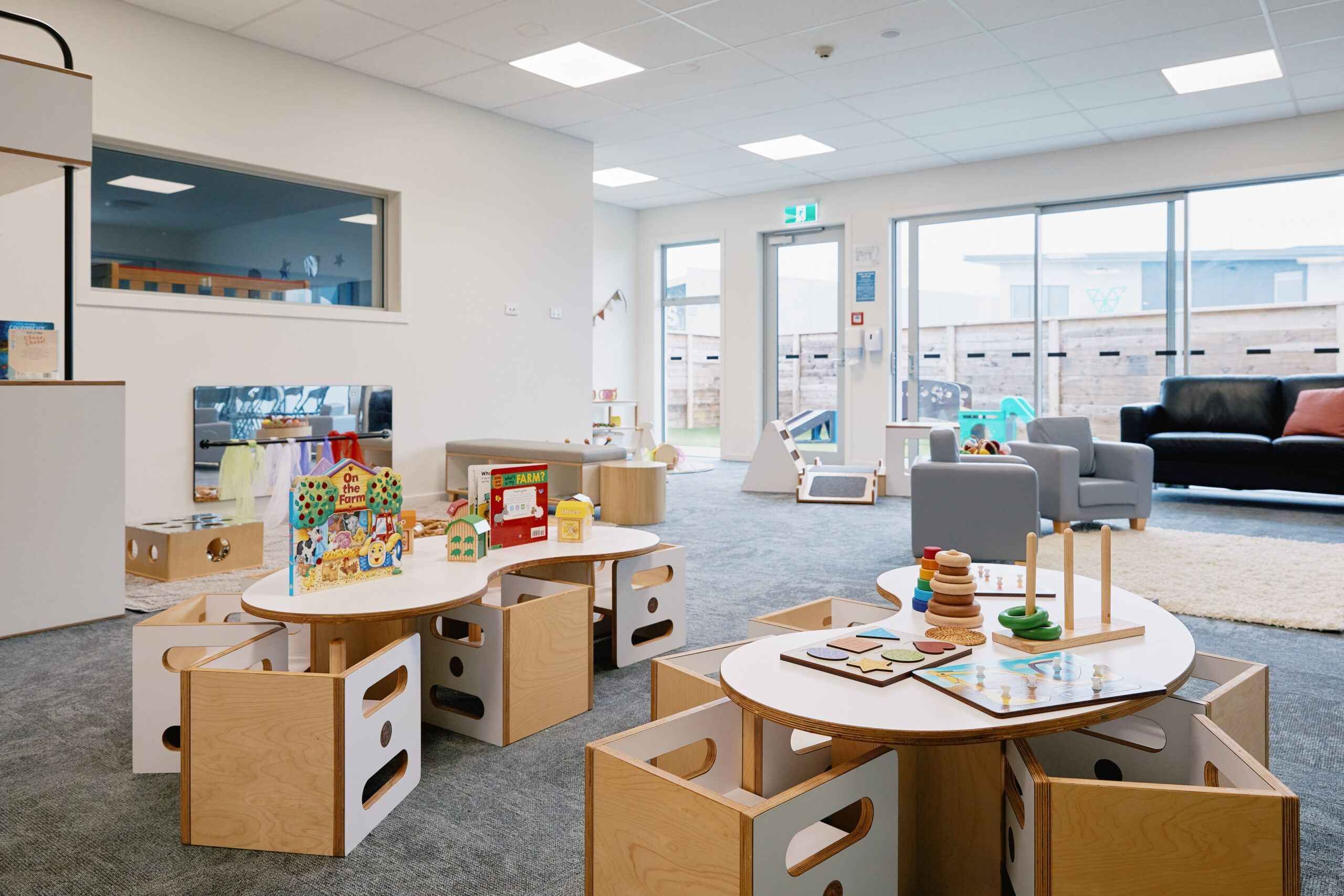 Nurture & Bloom | Indoor educational toy areas; wooden puzzles