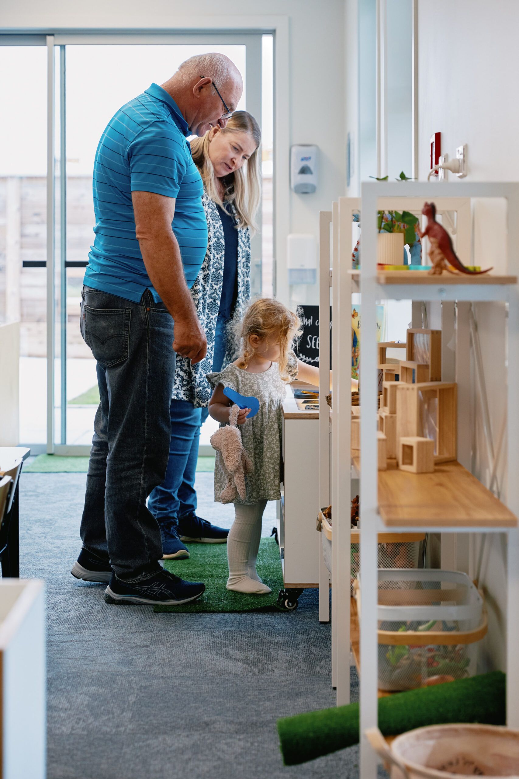 Nurture & Bloom | Parents / Grandparents enjoying watching their child learn & play